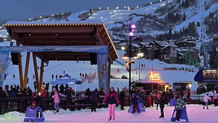 Ice skaters in the evening at Steamboat Square