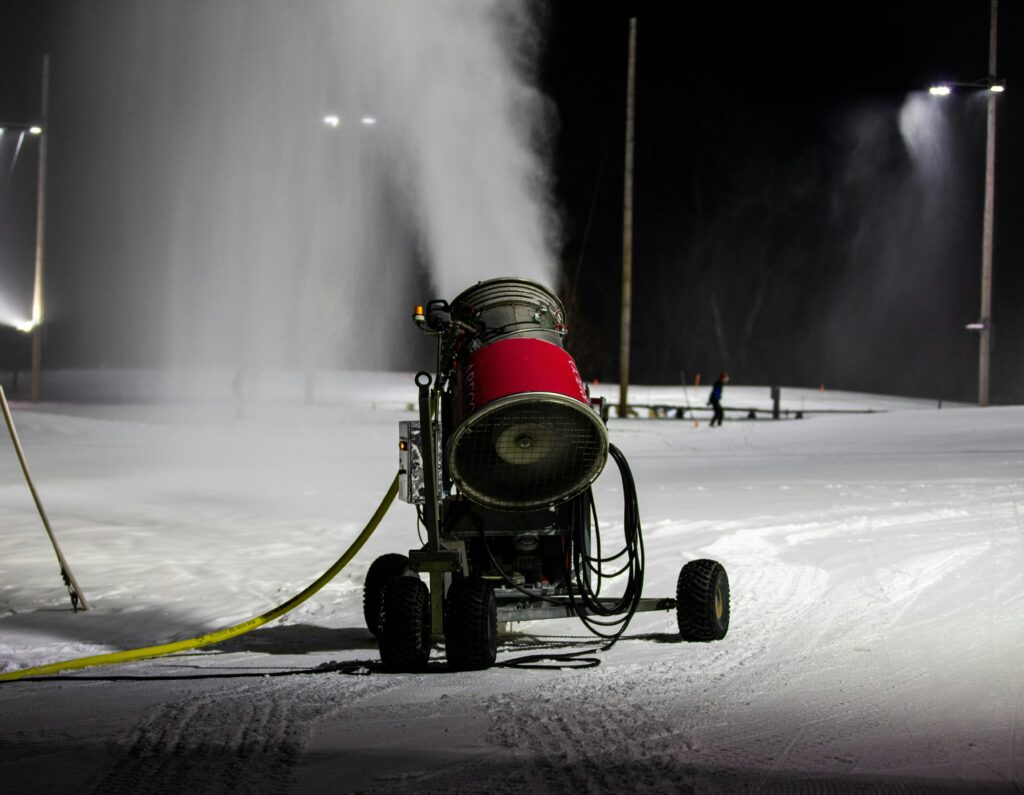 A snowmaker spraying out snow