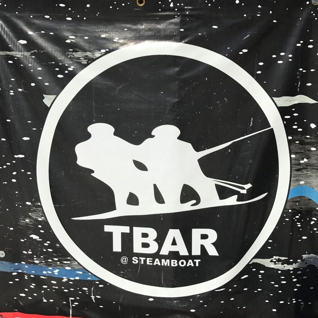 T bar logo
