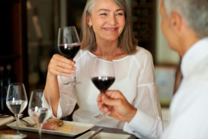 A couple enjoying luxury wines