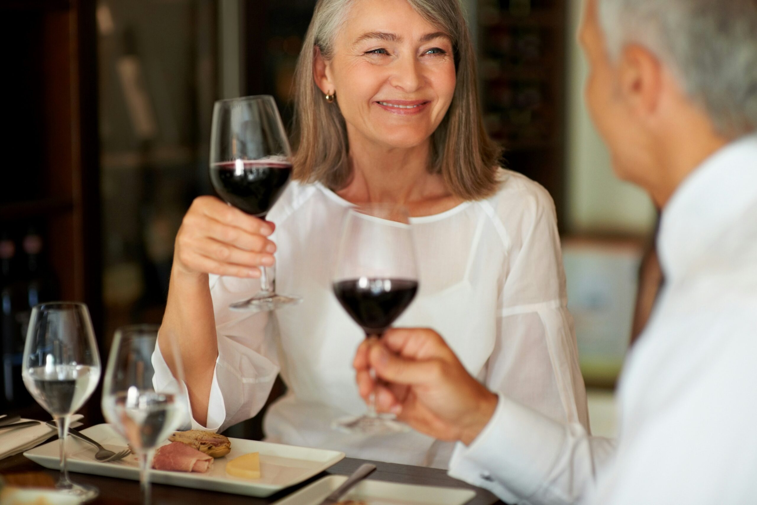 A couple enjoying luxury wines