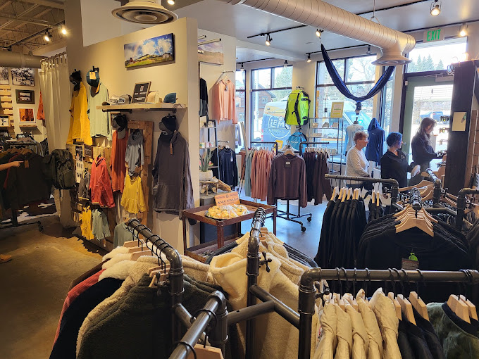 Clothes on rails inside Mountain and Company
