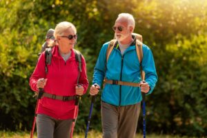 A couple hiking in the sunshine