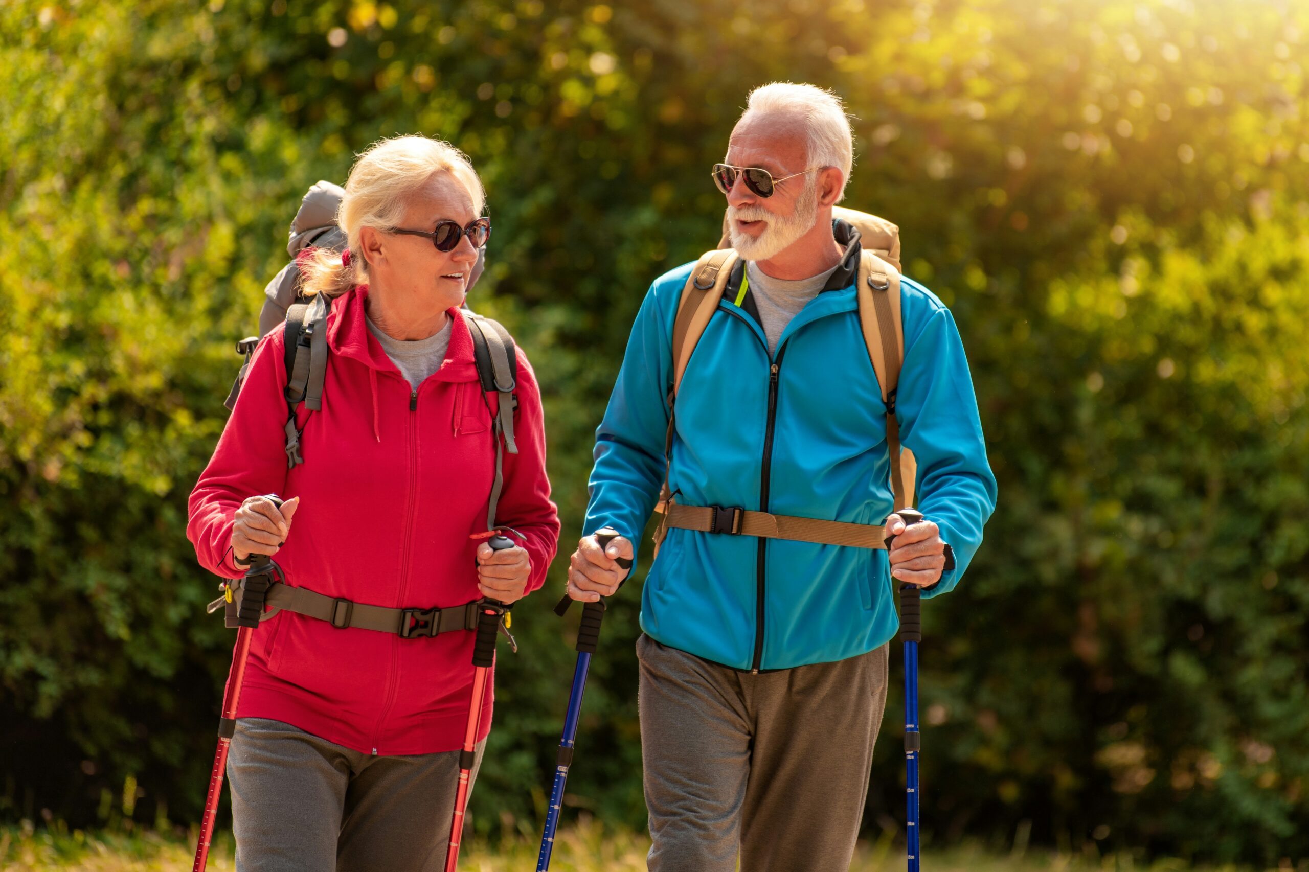 A couple hiking in the sunshine