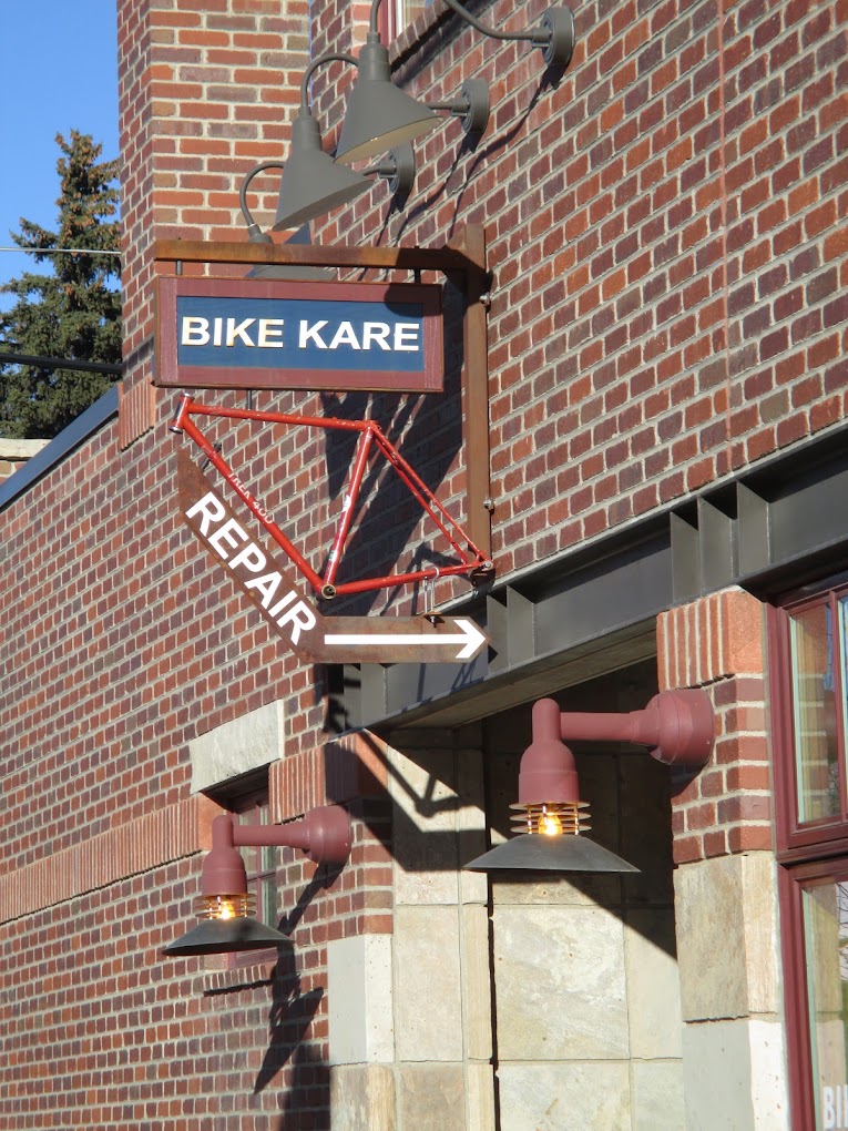 'Bike Kare' and 'Repair' signs