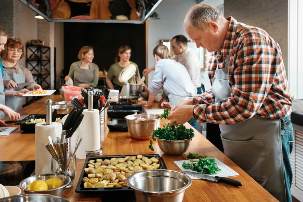 A large family cooking in a kitchen