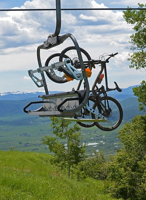 A lift carrying two bikes up to Christie Peak