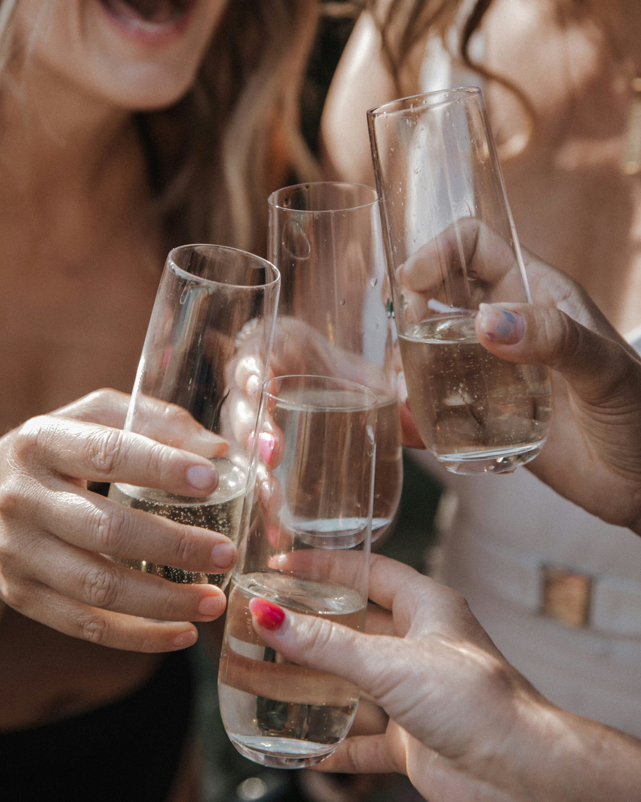 Women clinking glasses