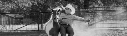 Young boy riding a horse during a rodeo event in Steamboat Springs.