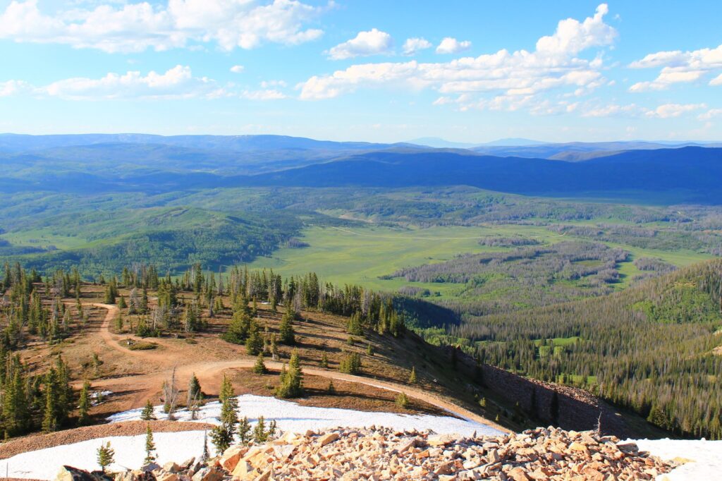 The view from Hahn's Peak, green valley with mountains in the distance.