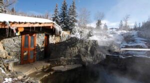 Beautiful stonework on a building and walkway surrounding a hot spring at Strawberry Park.