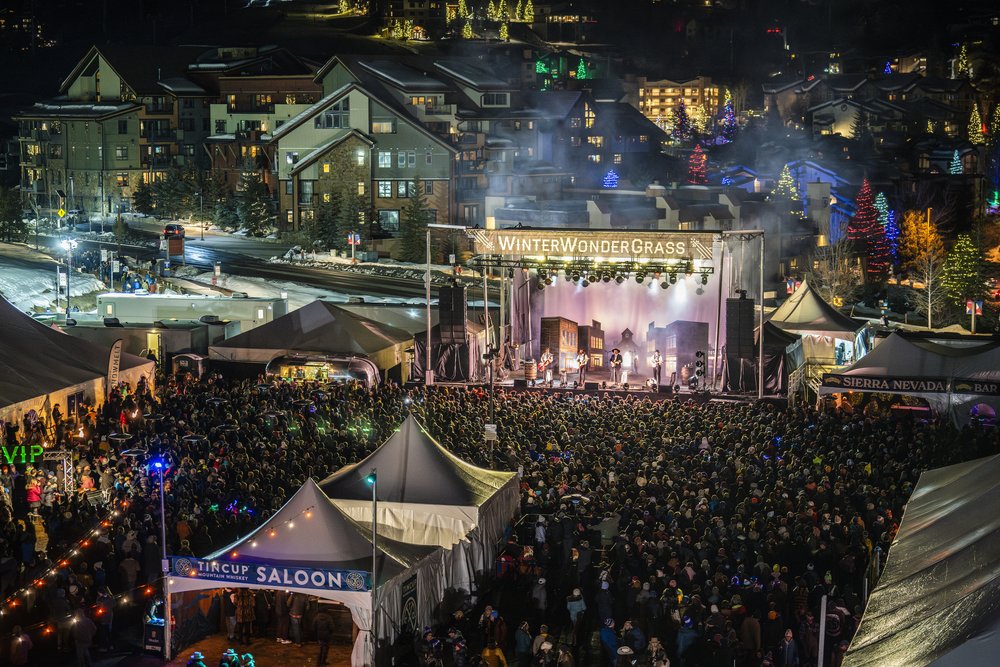 The WinterWonderGrass stage and crowds of people in front. This is an iconic February Event in Steamboat Springs. 