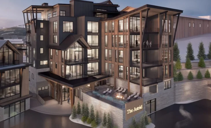 Exterior view of The Astrid mountain residences showing modern alpine architecture and building facade at dusk.