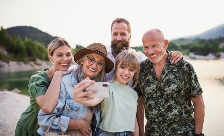 A family taking a group selfie together, enjoying the Fall family activities in Steamboat Springs
