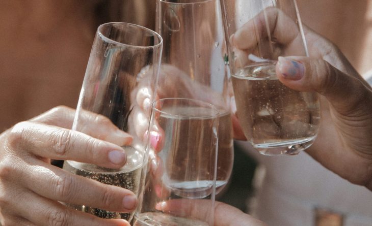 Women clinking glasses